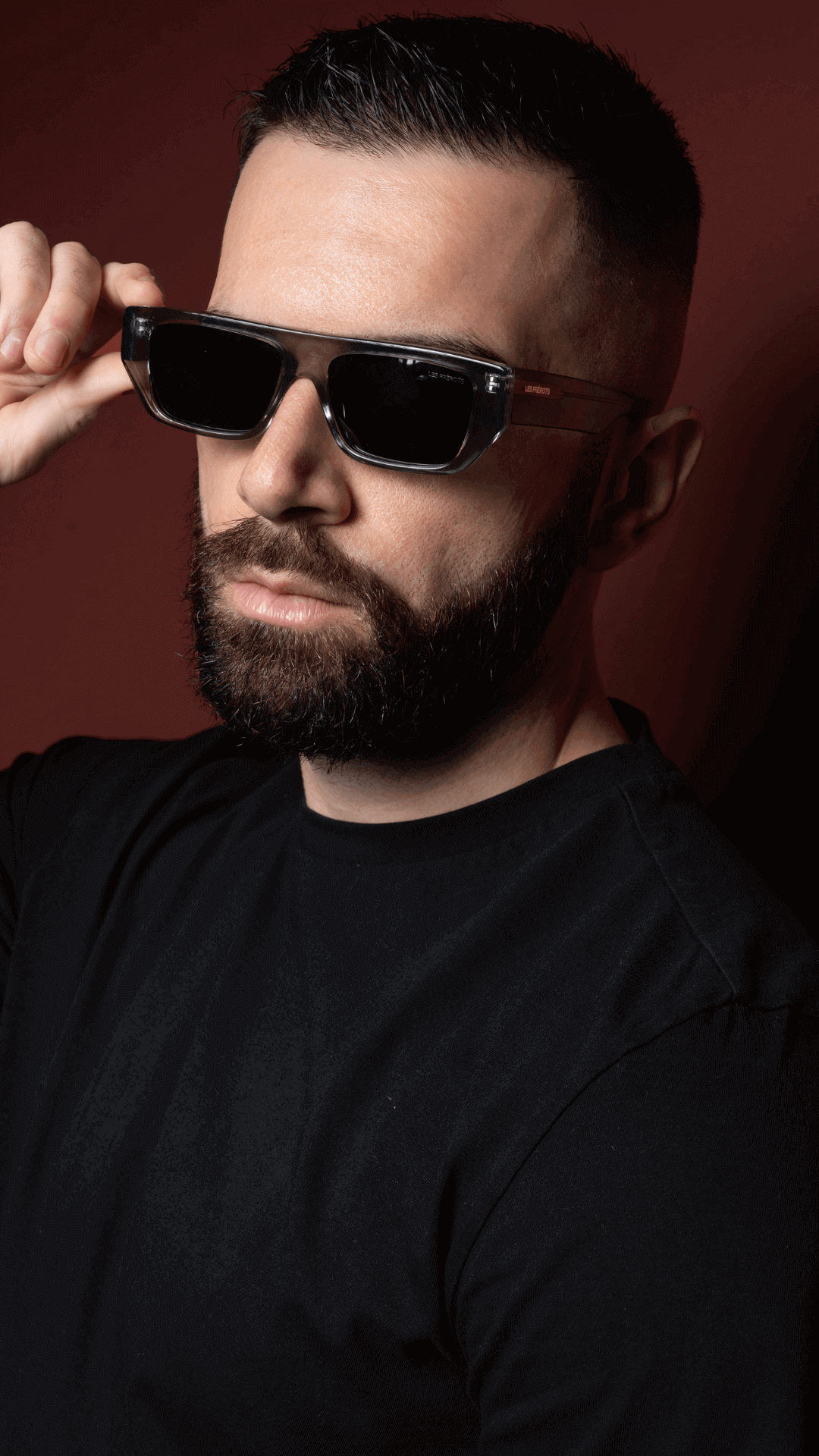Male model wearing futuristic transparent sunglasses