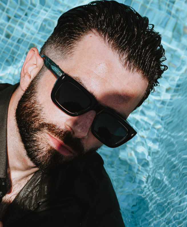 Man wearing sunglasses with a pool background and text about sunglasses features.